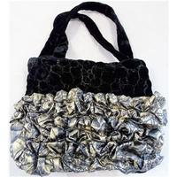 - Black - Top handle evening bag