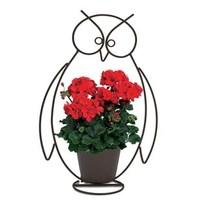 1 pre planted owl contour planter with red zonal geranium plants