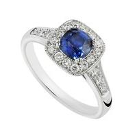 18ct white gold sapphire and 0.25 carat diamond ring