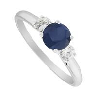 18ct white gold sapphire and 0.24 carat diamond three stone ring