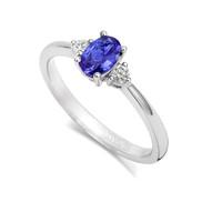 18ct White Gold 0.44ct Tanzanite and 0.10ct Diamond Oval Cluster Ring