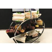 24 instead of 34 for a traditional afternoon tea for two people at ac  ...