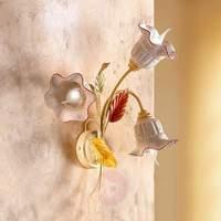 3 bulb giade wall light with a florentine style