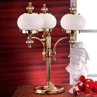 3-bulb Delia table lamp, glossy brass