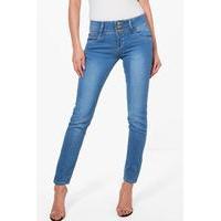 3 button high rise skinny jeans mid blue