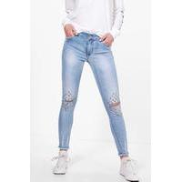 5 pocket mid rise stud slit knee skinny jeans blue