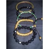 5 black gold and green bracelets