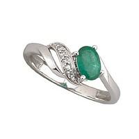9ct white gold emerald and diamond swirl ring