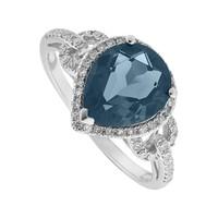 9ct white gold pear london blue topaz and 023 carat diamond ring