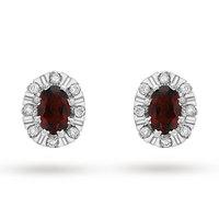 9ct white gold oval cut garnet and 017cttw diamond stud earrings