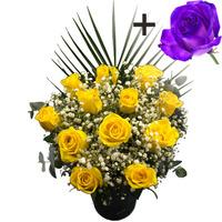 A single Purple Rose surrounded by 11 Yellow Roses