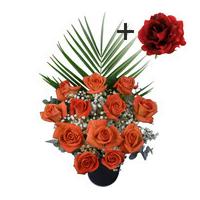 a single red silk rose surrounded by 11 orange roses