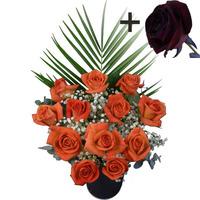 A single Black Rose surrounded by 11 Orange Roses