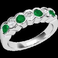 A stylish Round Brilliant Cut emerald & diamond eternity ring in 9ct white gold (In stock)