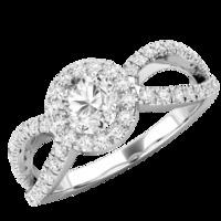 A stunning Round Brilliant Cut diamond ring with shoulder stones in platinum (In stock)