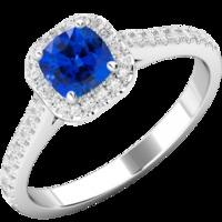 A stunning Cushion Cut Ceylon Sapphire and Diamond halo ring in platinum (In stock)