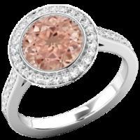 A stunning Morganite and diamond halo cluster ring set in 18ct white gold (In stock)
