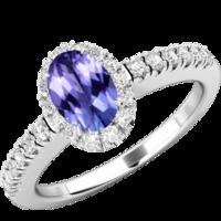 A beautiful Tanzanite and diamond cluster with shoulder stones in 18ct white gold (In stock)