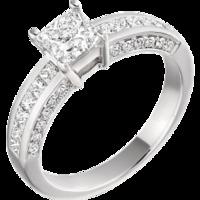 A magnificent Princess Cut diamond ring with shoulder stones in platinum (In stock)