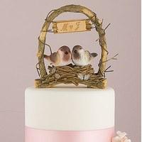 a love nest love birds in archway cake topper