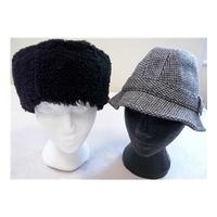 A tweed trilby and a black cossack hat