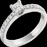 A striking Princess Cut diamond ring with shoulder stones in 18ct white gold