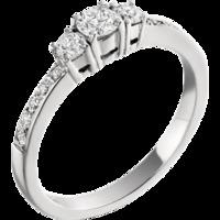 A beautiful three stone diamond ring with shoulder stones in 18ct white gold