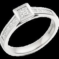 a striking princess cut diamond ring with shoulder stones in 18ct whit ...