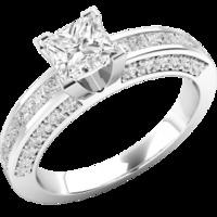 A magnificent Princess Cut diamond ring with shoulder stones in 18ct white gold