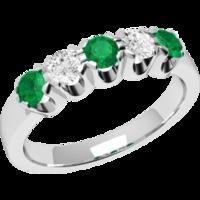 A luxurious Round Brilliant Cut emerald & diamond ring in 18ct white gold