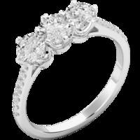 a stunning three stone diamond ring with shoulder stones in 18ct white ...