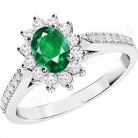 a classic emerald diamond cluster style ring in 18ct white gold