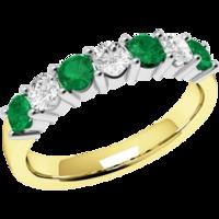 A beautiful emerald & diamond eternity ring in 18ct yellow & white gold