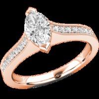 A beautiful Marquise Cut diamond ring with shoulder stones in 18ct rose gold