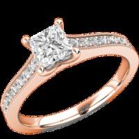 A beautiful Princess Cut diamond ring with shoulder stones in 18ct rose gold