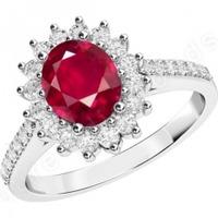 a beautiful ruby and diamond cluster ring in 18ct white gold