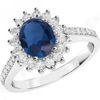 A delightful sapphire and diamond cluster in 18ct white gold