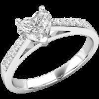 a charming heart shaped diamond ring with shoulder stones in platinum