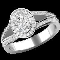 A beautiful oval diamond cluster style ring with shoulder stones in platinum