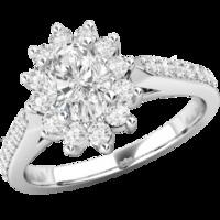 A classic oval diamond cluster style ring with diamond shoulders in platinum