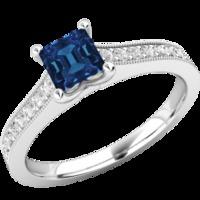 A beautiful square cut Sapphire and diamond ring with shoulder stones in 18ct white gold