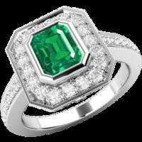 a classic emerald diamond cluster style ring in 18ct white gold