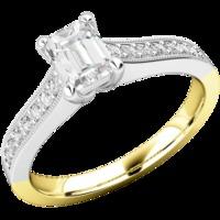 A beautiful Emerald Cut diamond ring with shoulder stones in 18ct yellow & white gold