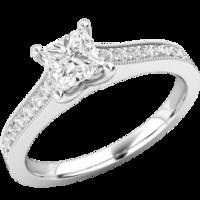 A beautiful Princess Cut diamond ring with shoulder stones in 18ct white gold