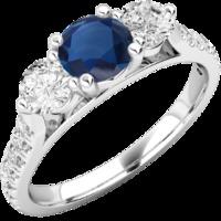 A luxurious sapphire & diamond ring with shoulder stones in platinum