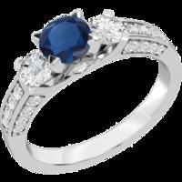 A luxurious sapphire & diamond ring with shoulder stones in 18ct white gold