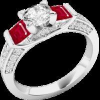 A stunning Round Brilliant Cut diamond and Ruby ring with shoulder stones in 18ct white gold