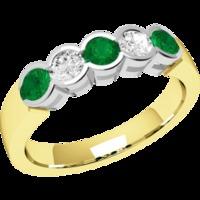 A stylish Round Brilliant Cut emerald & diamond eternity ring in 9ct yellow & white gold