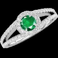 a stunning round cut emerald and diamond ring with shoulder stones in  ...