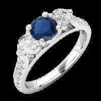 A luxurious sapphire & diamond ring with shoulder stones in 18ct white gold